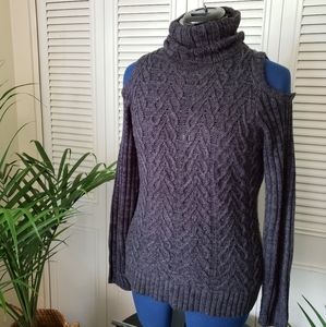 Cold shoulder turtleneck sweater